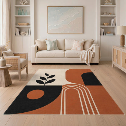 Geometric Area Rug with Leaf Silhouette in Earth Tones
