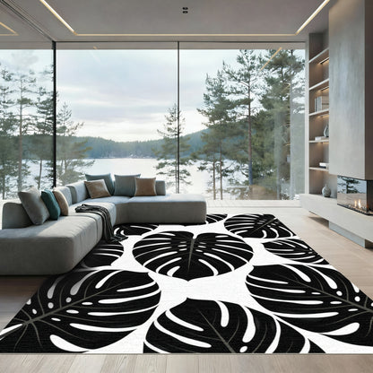 Bold Black Tropical Leaf Collage Rug