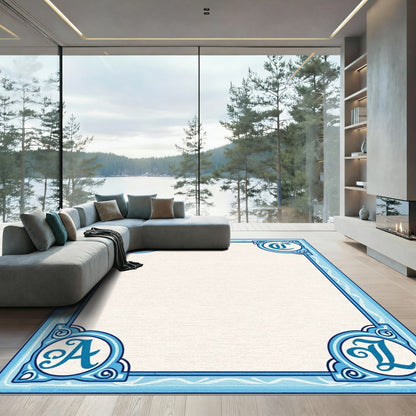 Aqua Monogram Ornamental Border Rug