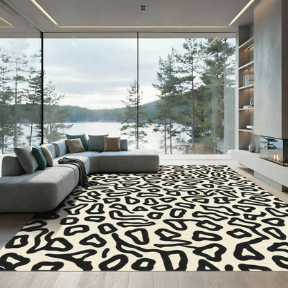 Organic Black Cream Abstract Leopard Rug