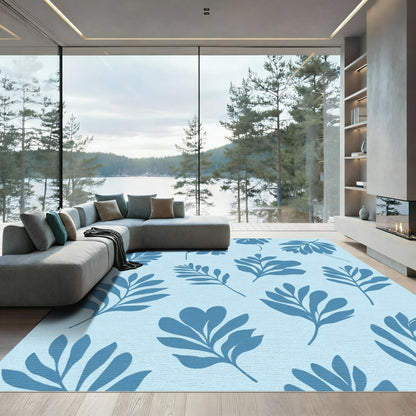 Blue Silhouetted Leaves On Light Blue Rug