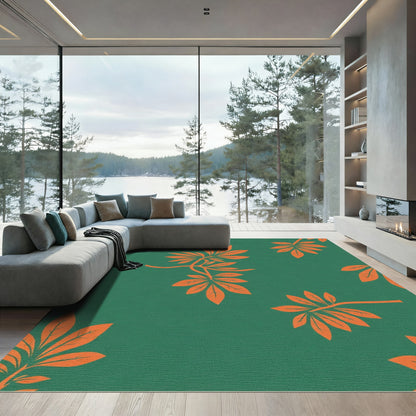 Vibrant Orange Leafy Branches on Green Rug