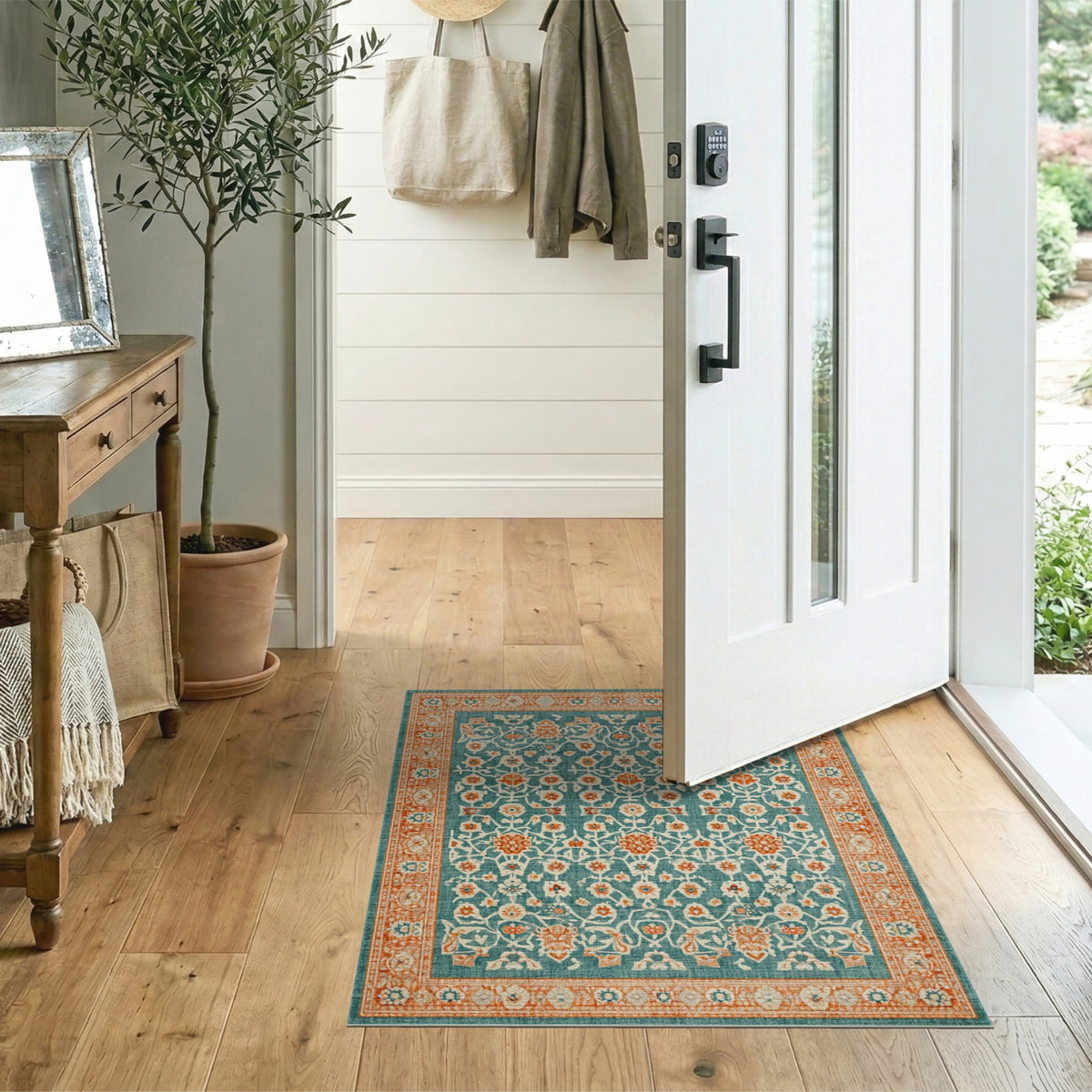 Teal Floral Vintage Area Rug with Orange Accents