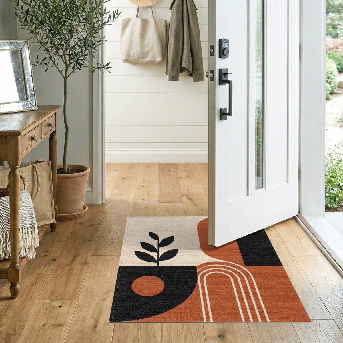 Geometric Area Rug with Leaf Silhouette in Earth Tones