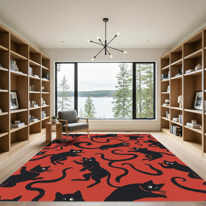 Playful Black Cats on Red Background Rug