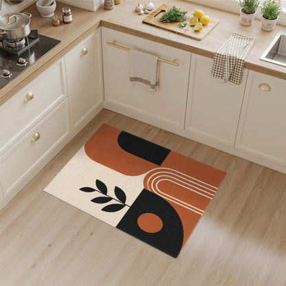 Geometric Area Rug with Leaf Silhouette in Earth Tones