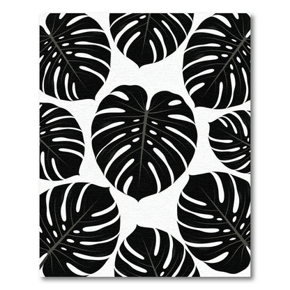 Bold Black Tropical Leaf Collage Rug
